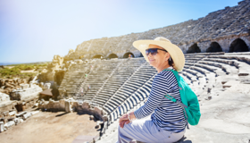 Lady On Holiday wearing a hat