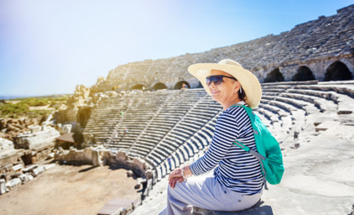 Lady On Holiday wearing a hat