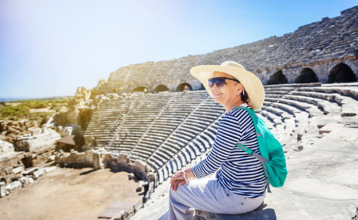 Lady On Holiday wearing a hat