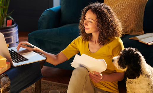 Lady On Laptop With Dog