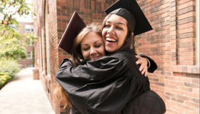 Two Happy Girls Graduating Landscape