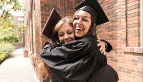 Two Happy Girls Graduating Landscape
