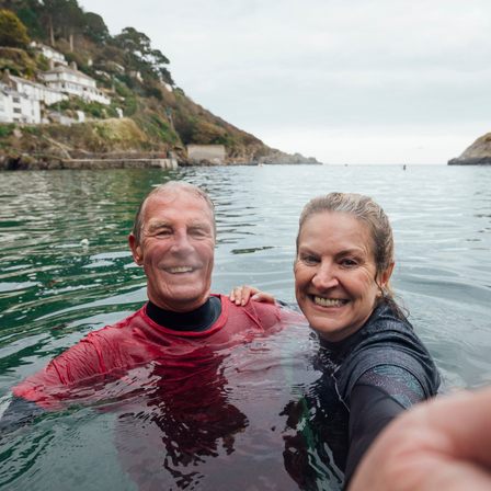 Couple Swimming On Holiday