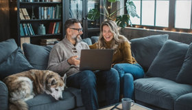 Couple On Sofa With Dog Landscape