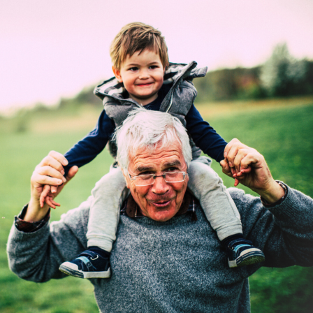 Grandad Carrying Grandson