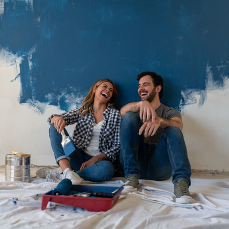 Couple Painting New House