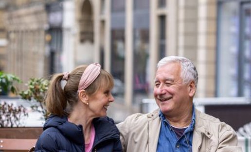 Older Couple Relaxing At A Cafe