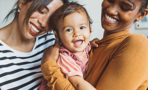 two mums with daughter