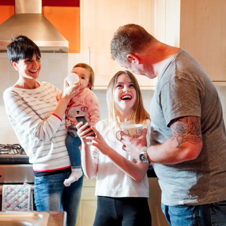 Happy Family With Baby And Child