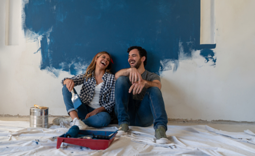 Couple Painting New House 