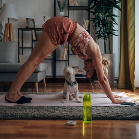 Lady And Dog Doing Yoga