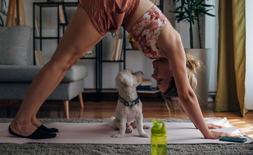 Lady And Dog Doing Yoga