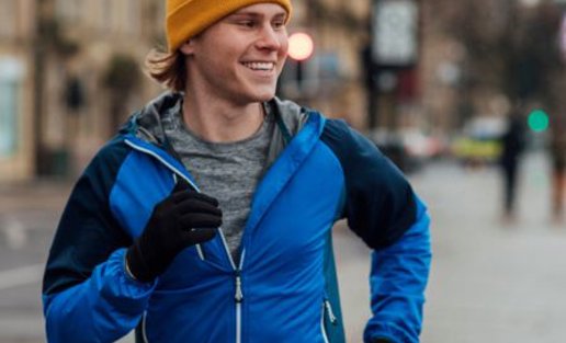 Young Man Running In The City