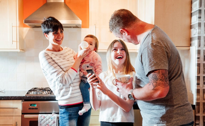 Happy Family With Baby And Child Landscape