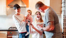 Happy Family With Baby And Child Landscape