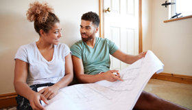 Couple In New Build Home Landscape