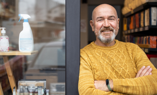 Man Outside His Shop