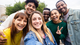 A group of young adults posing for a photo
