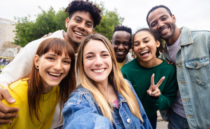A group of young adults posing for a photo