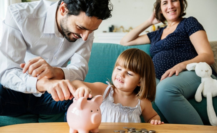 Family With Child And Piggybank Landscape