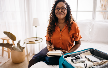 older lady packing for a holiday