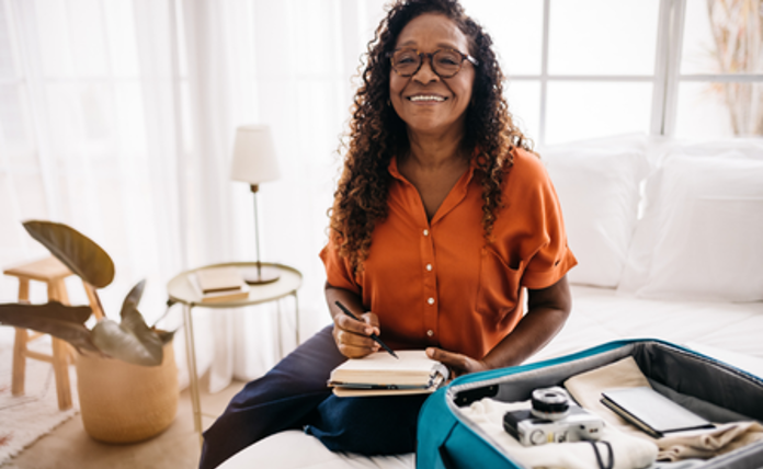 older lady packing for a holiday