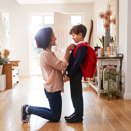Mum Getting Son Ready For School