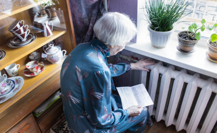 Older lady worried about heating bills 