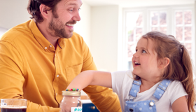 Dad and daughter counting pennies