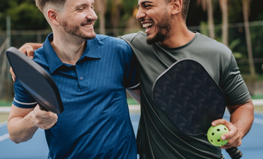 Two Male Friends Playing Pickleball