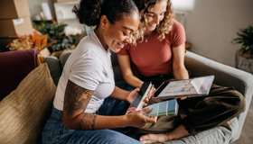 Two Women Planning Home Decorating Together Landscape