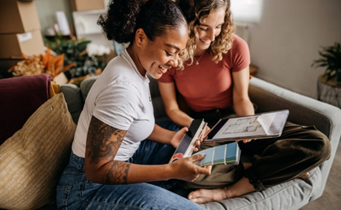 Two Women Planning Home Decorating Together Landscape