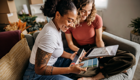 Two Women Planning Home Decorating Together Landscape